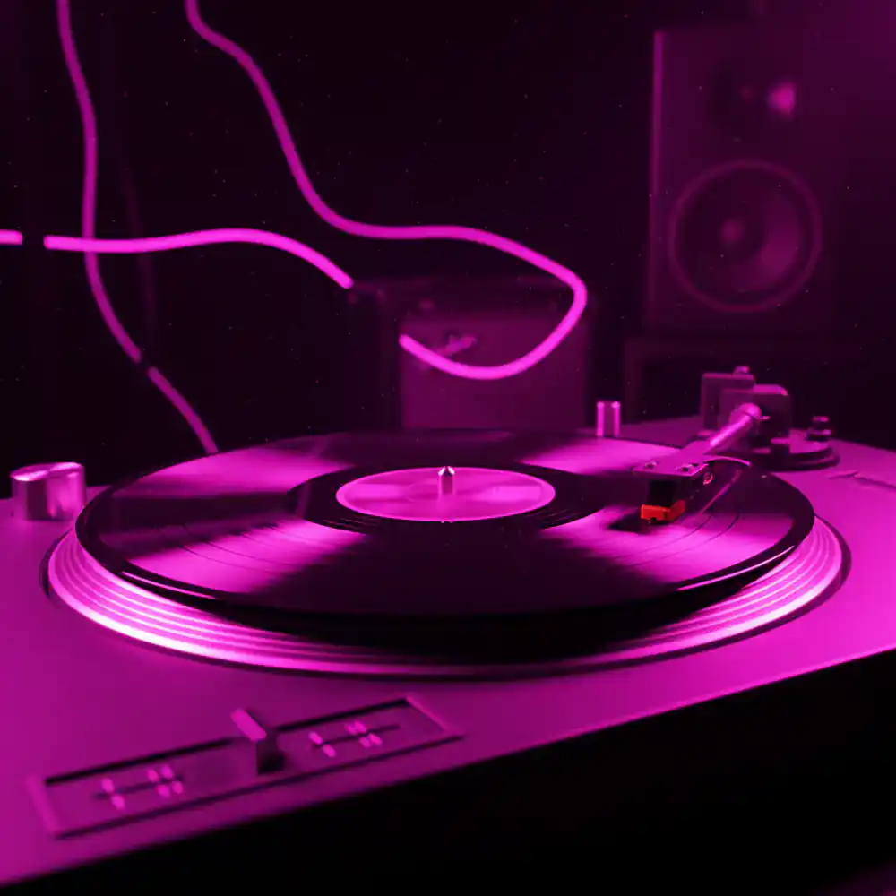 Spinning vinyl record bathed in neon pink light