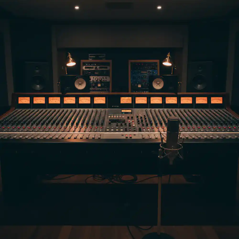 Analog mixing console with glowing meters